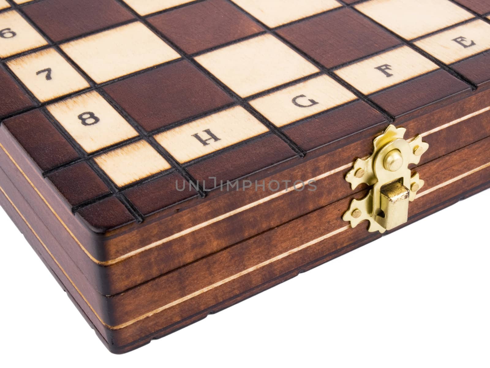 Closeup picture of wooden chessboard on white background.
