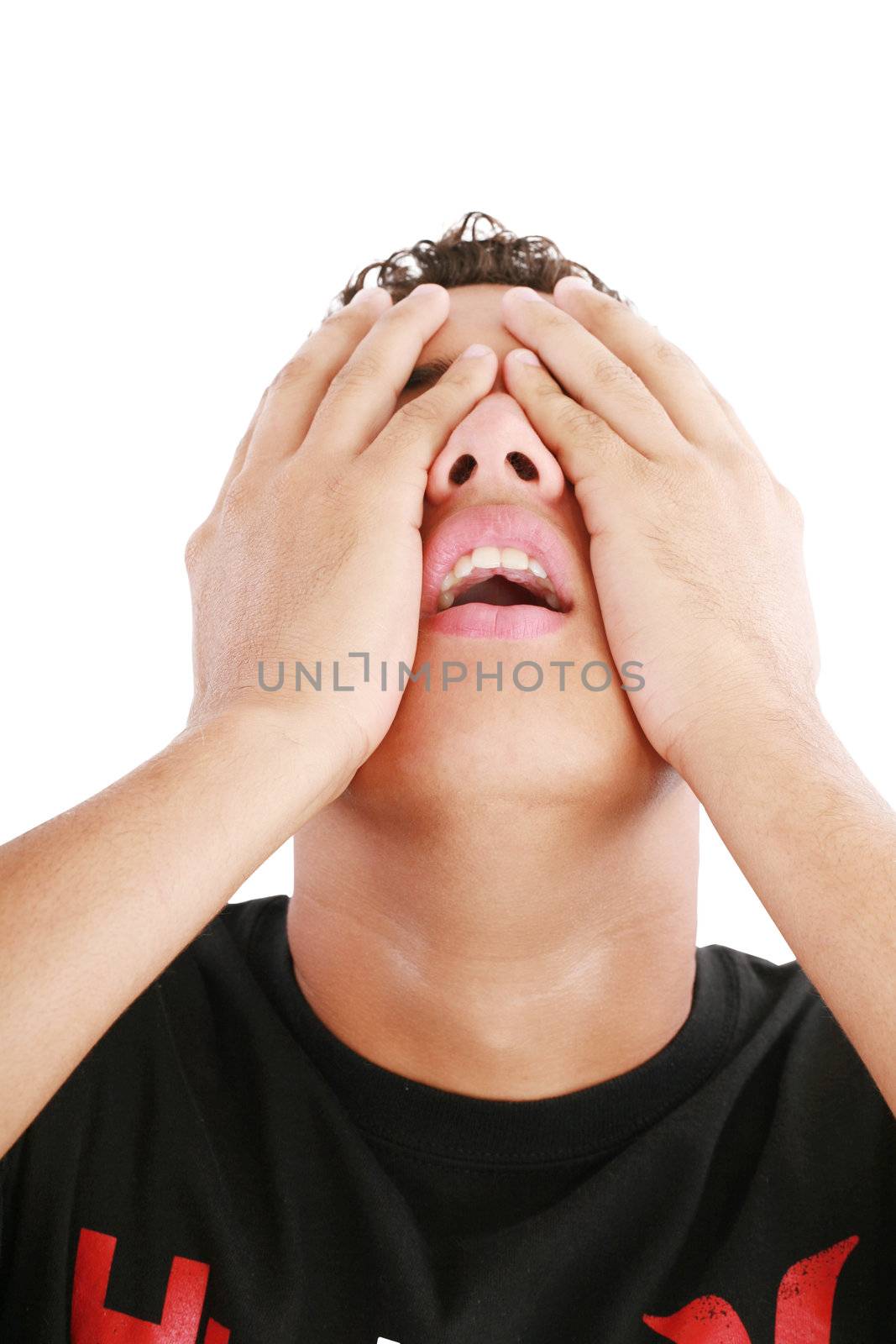 desperate teenage boy on white background