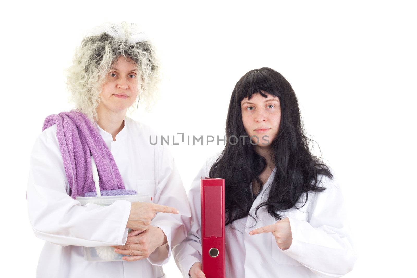 Female cleaners in white work coats