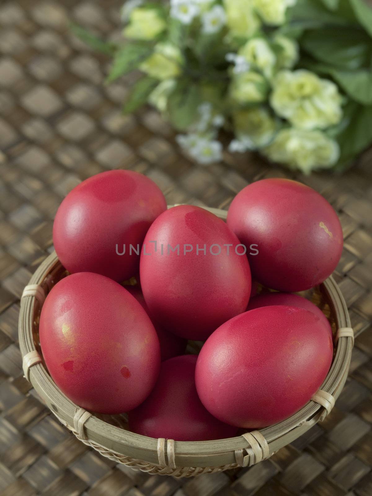 close up of a basket of chinese baby first birthday eggs