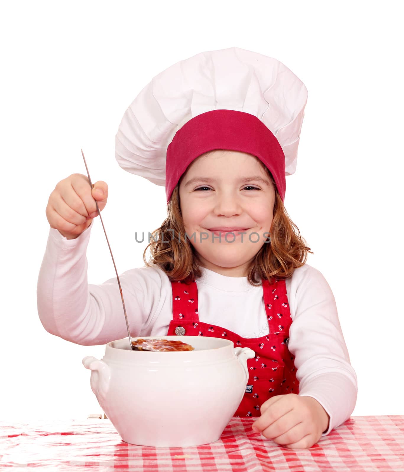 happy little girl cook with soup