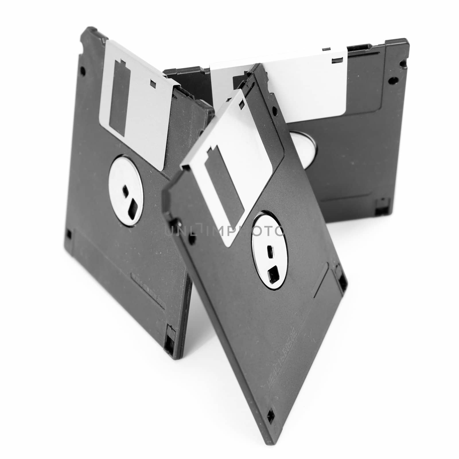 Three diskettes on a white background