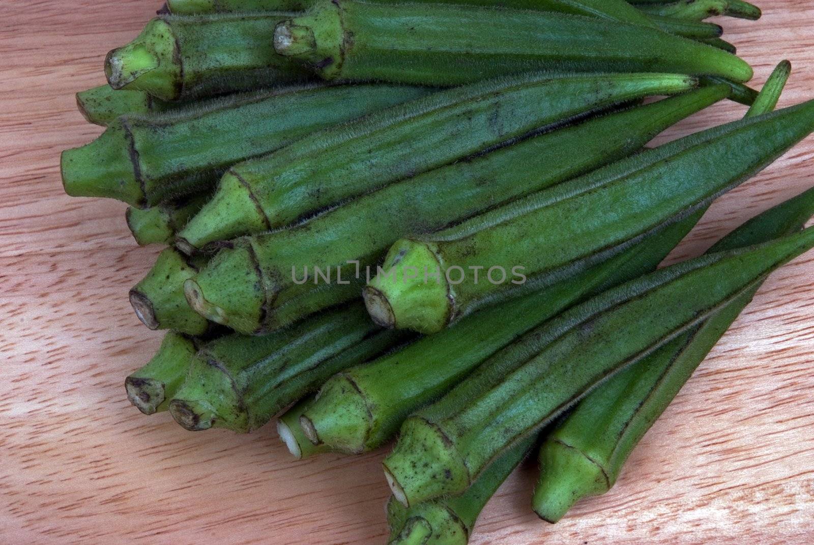 A group of Okra on a cutting board