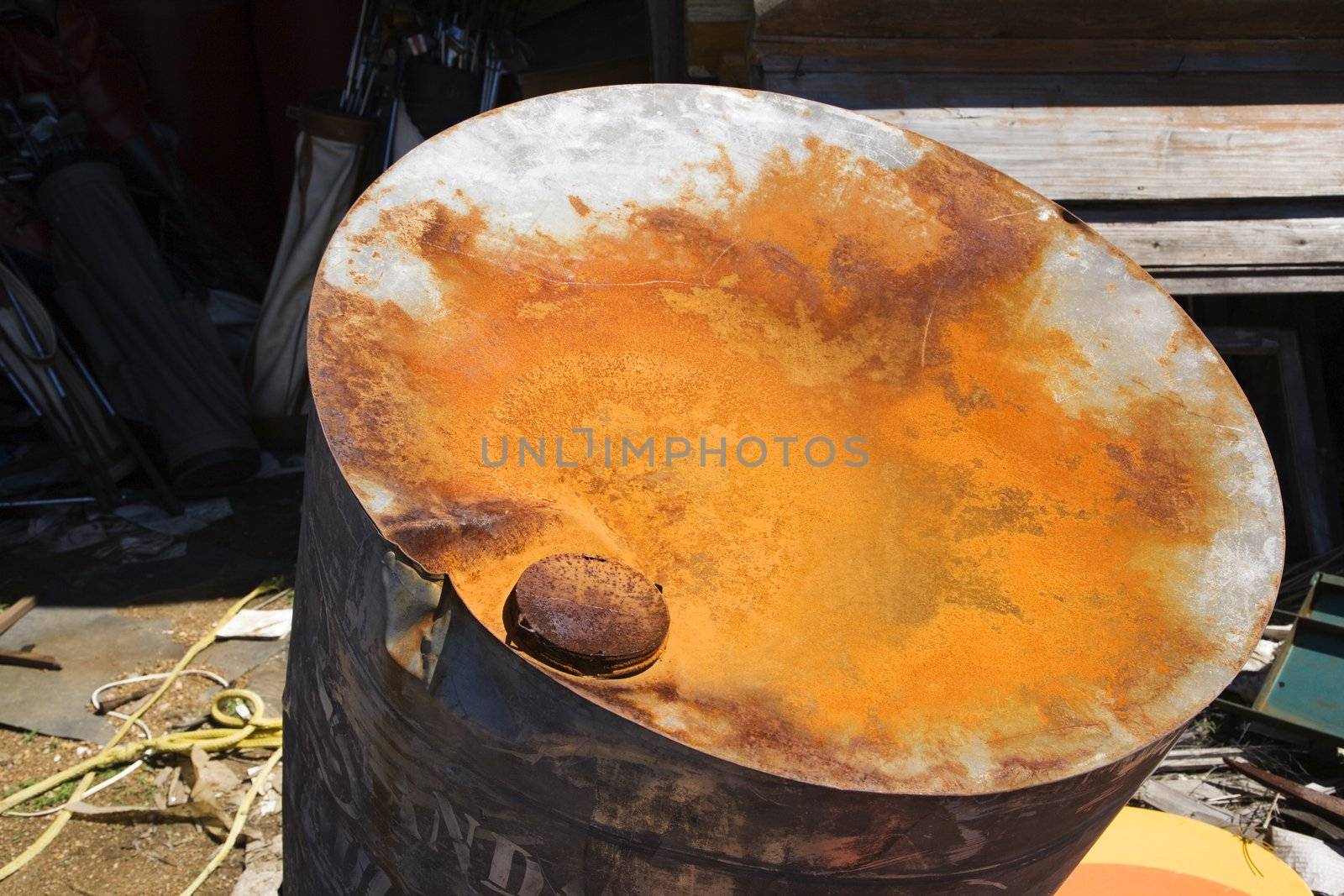 Old rusty oil barrel by iofoto