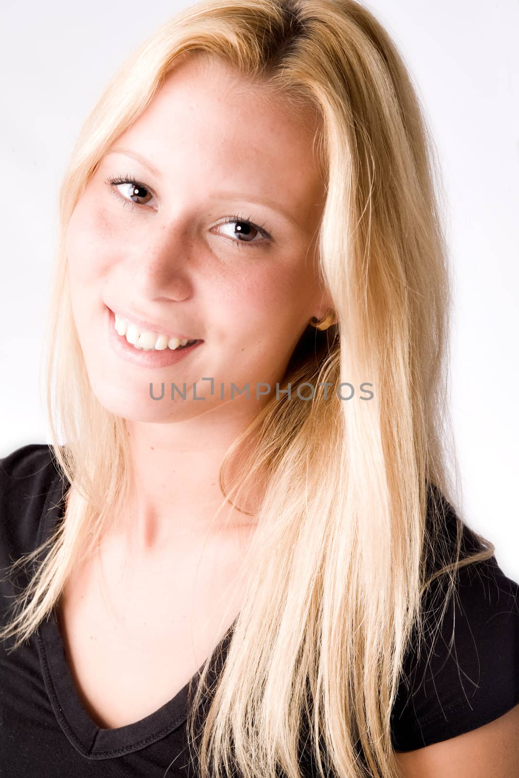 Studio portrait of a young blond girl