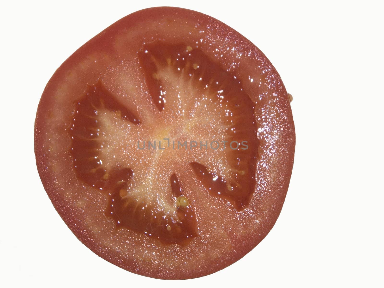 Half of tomato on a white background