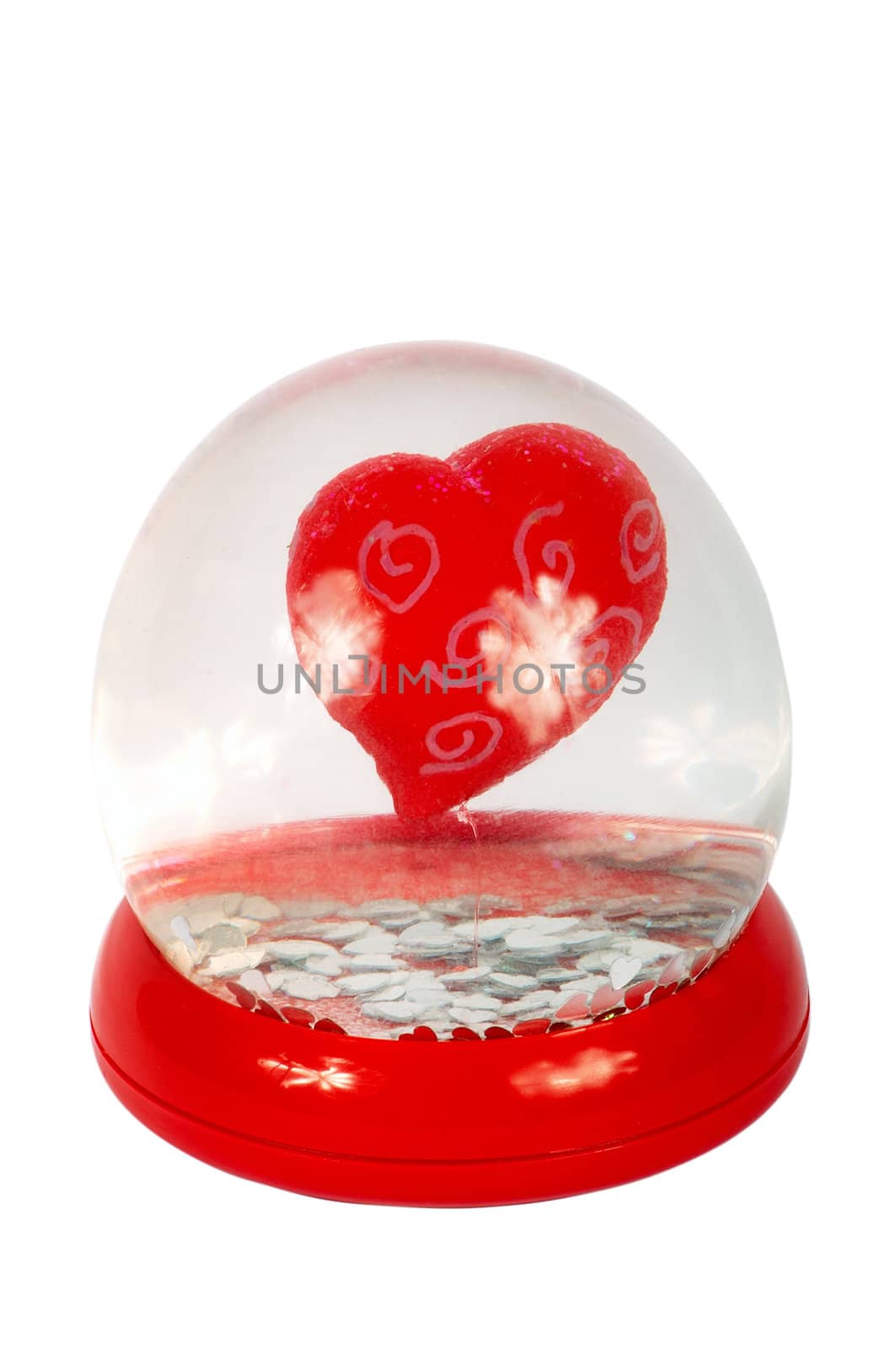 Glass sphere with heart on a white background