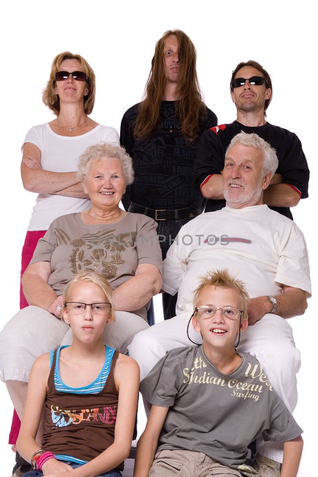 Studio family portrait of a funny family of 3 generations