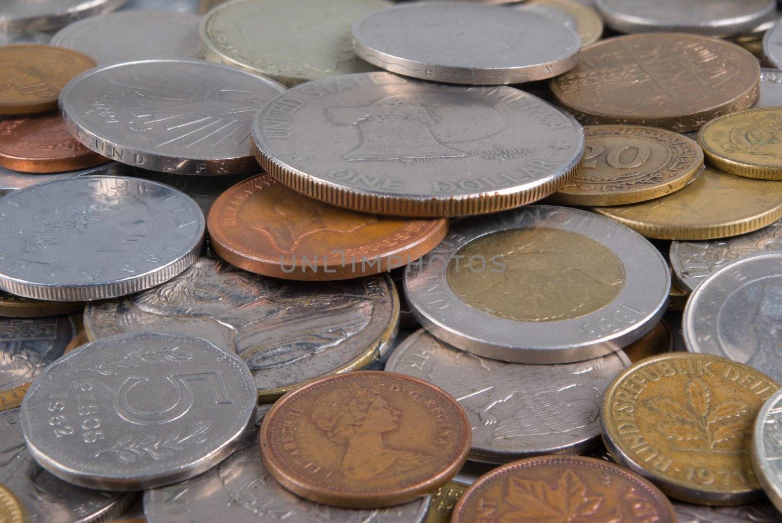 Much coins of the different countries. Dollar over all