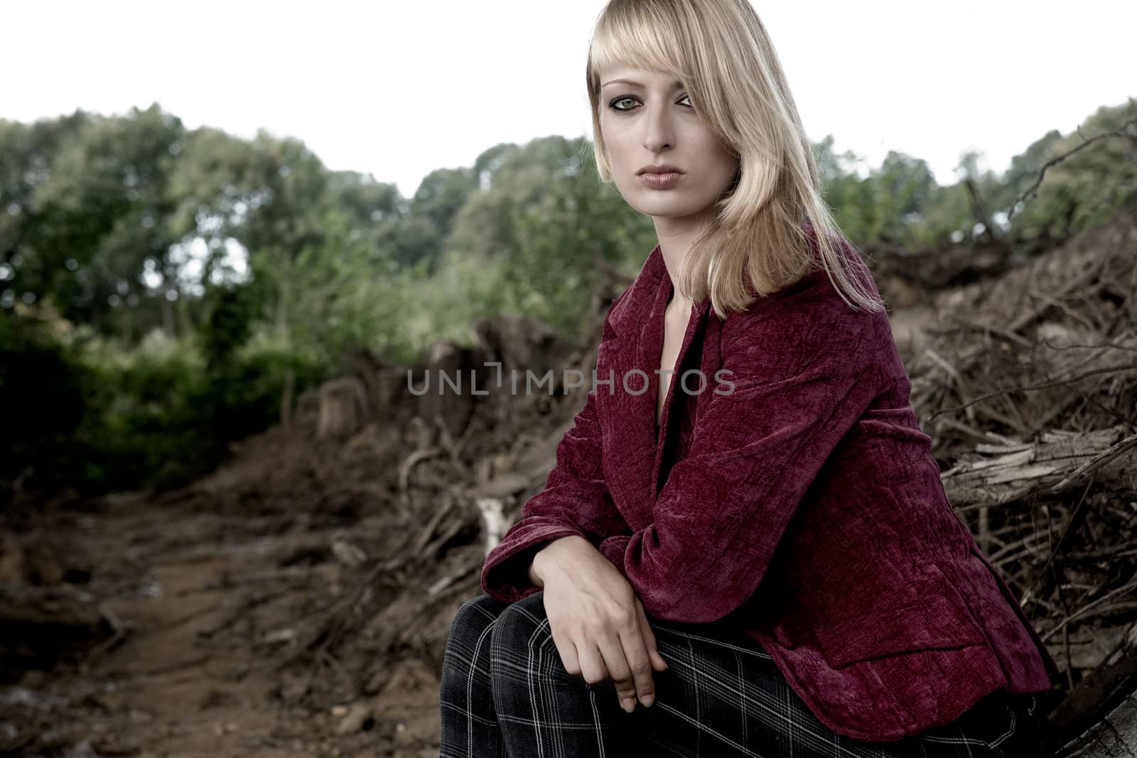 Fashion shoot of a woman sitting on the ground
