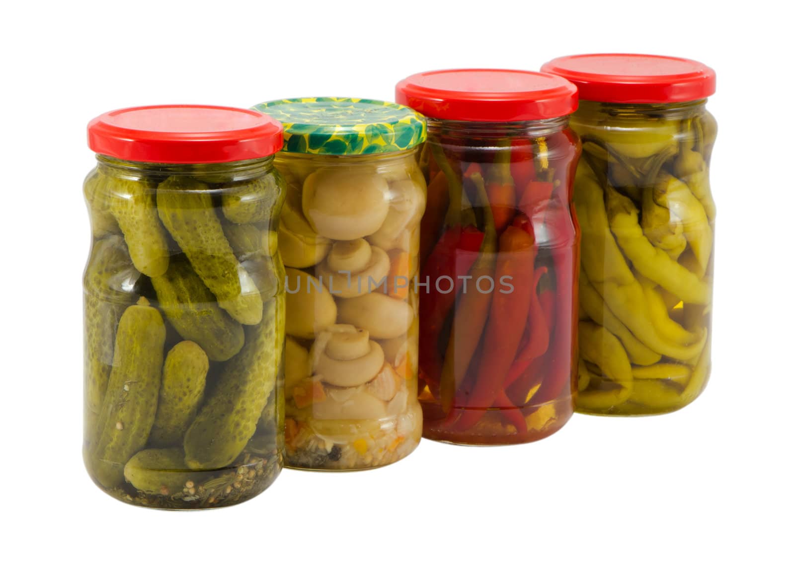 ecological natural food resource for winter mushroom peppers and cucumbers preserved in glass pots jars isolated on white background