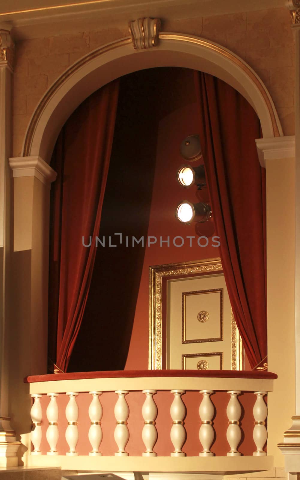 Theater lodge with arc, curtain and spotlight