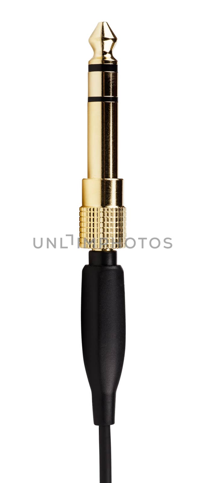 Macro view of golden audio plug isolated over white background