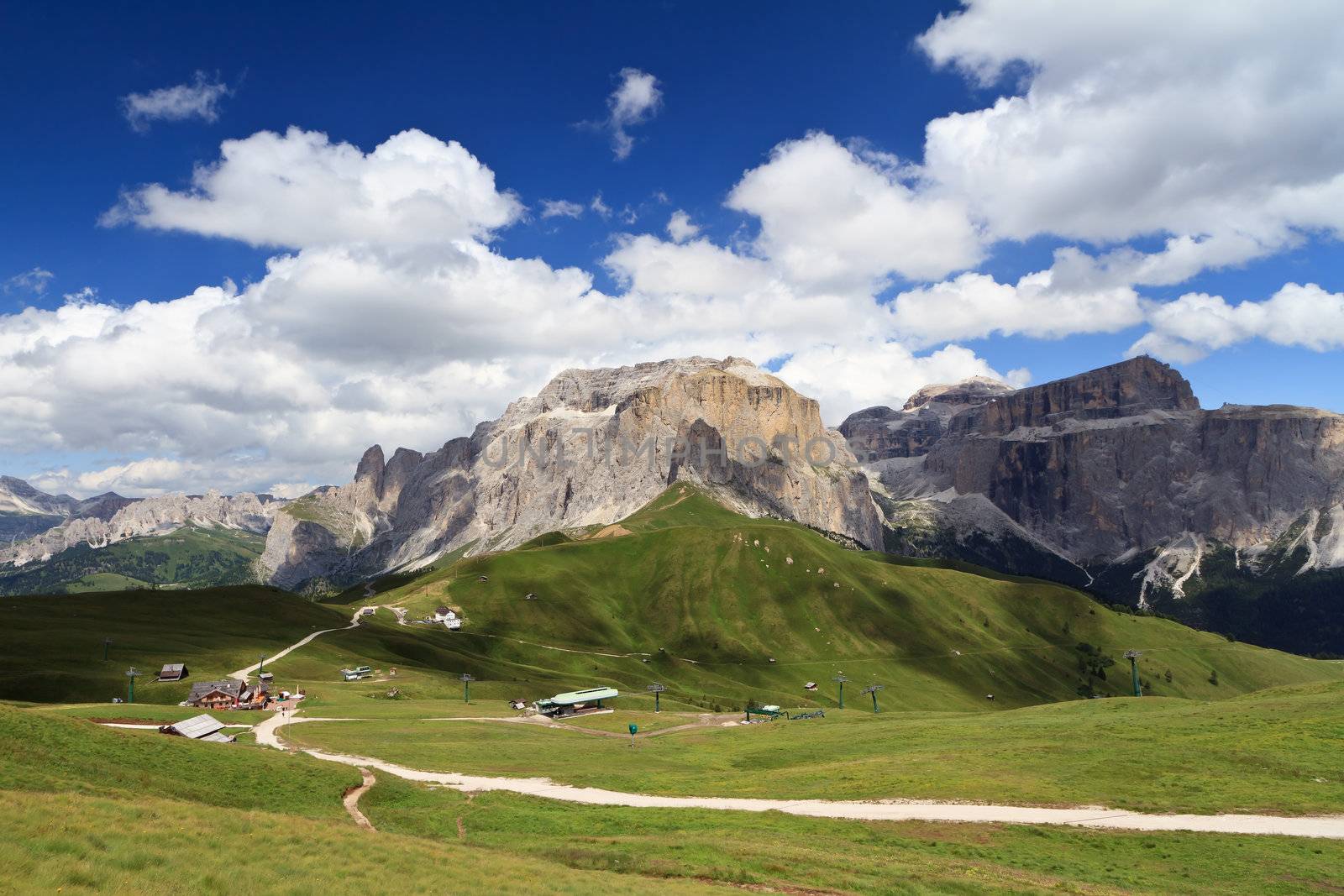 summer view of Sella Mountain and Sella pass with Saas Pordoi peak, Trentino Italy