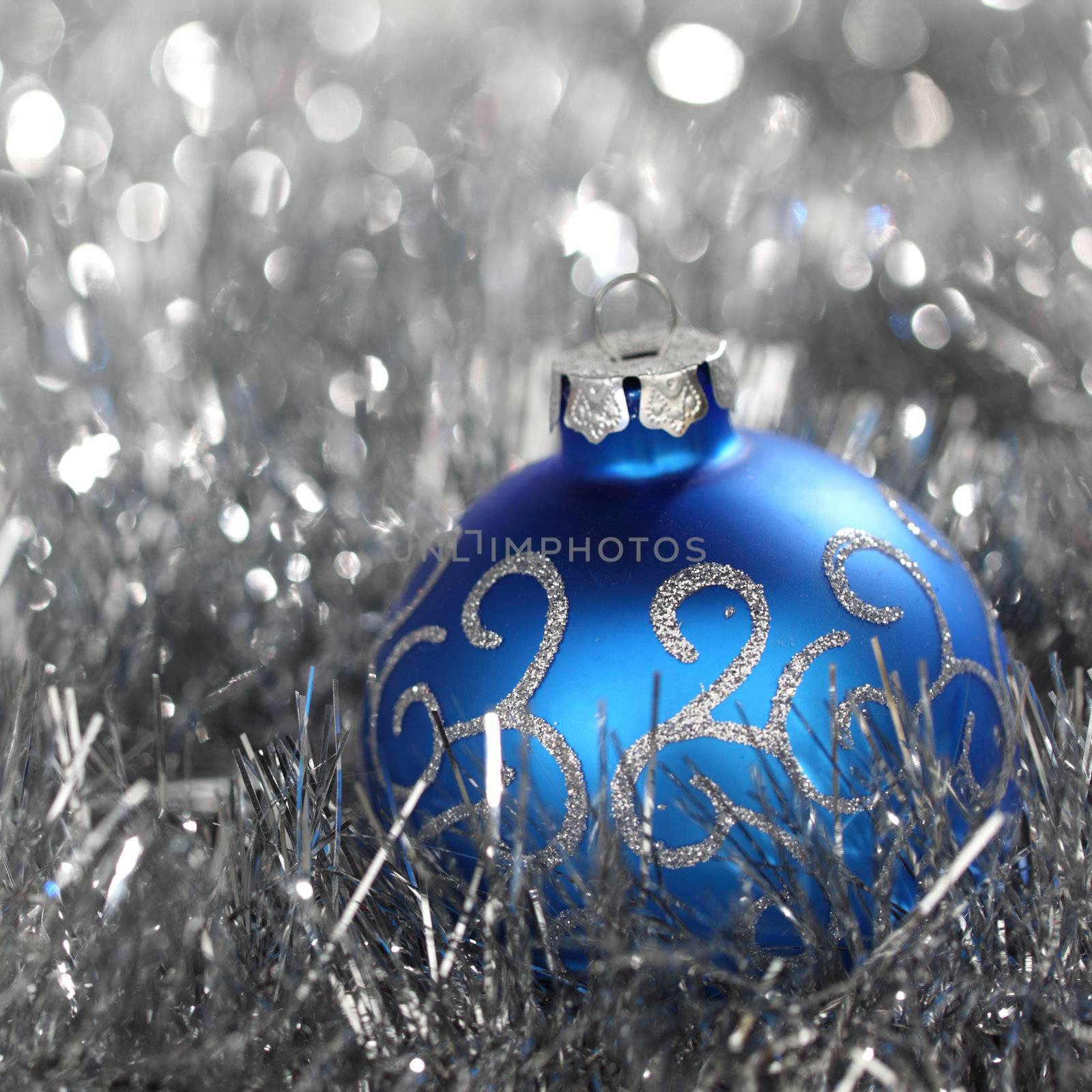 blue christmas ball on silver background