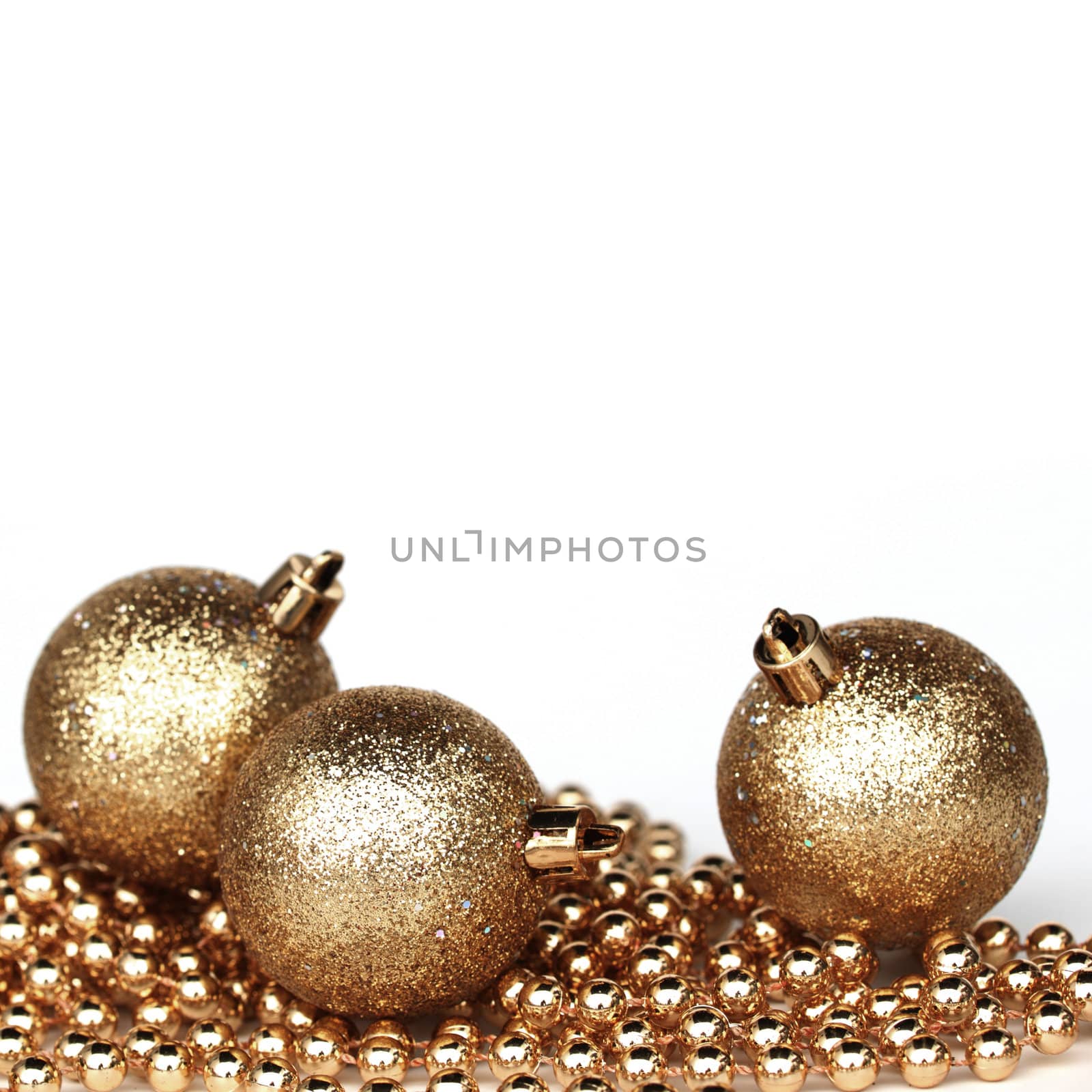  golden christmas ball isolated on white