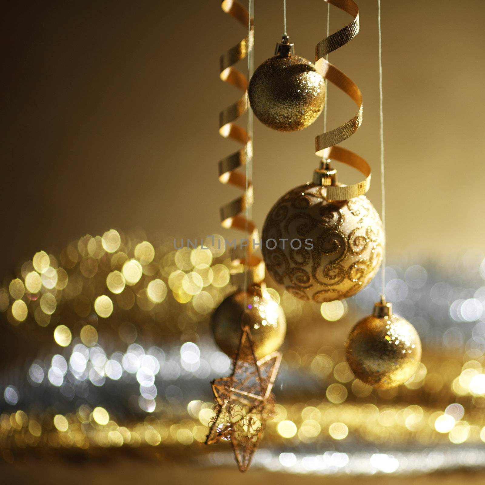 golden christmas balls on bokeh background