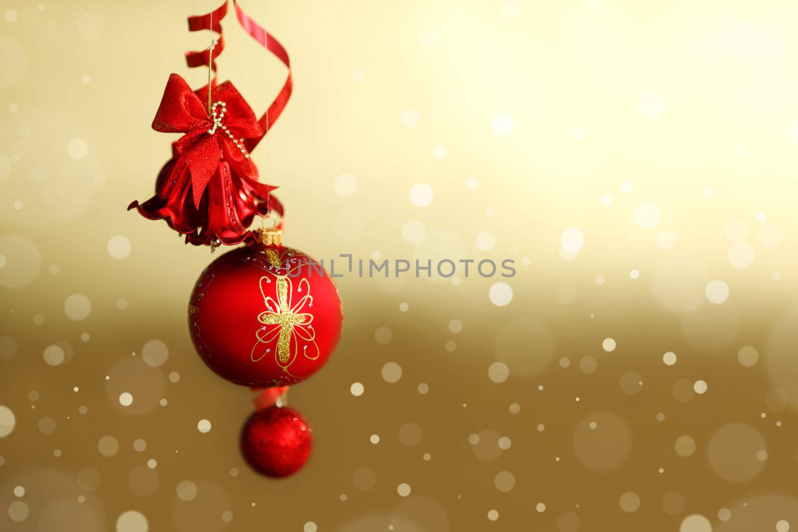  red christmas balls on gold  background