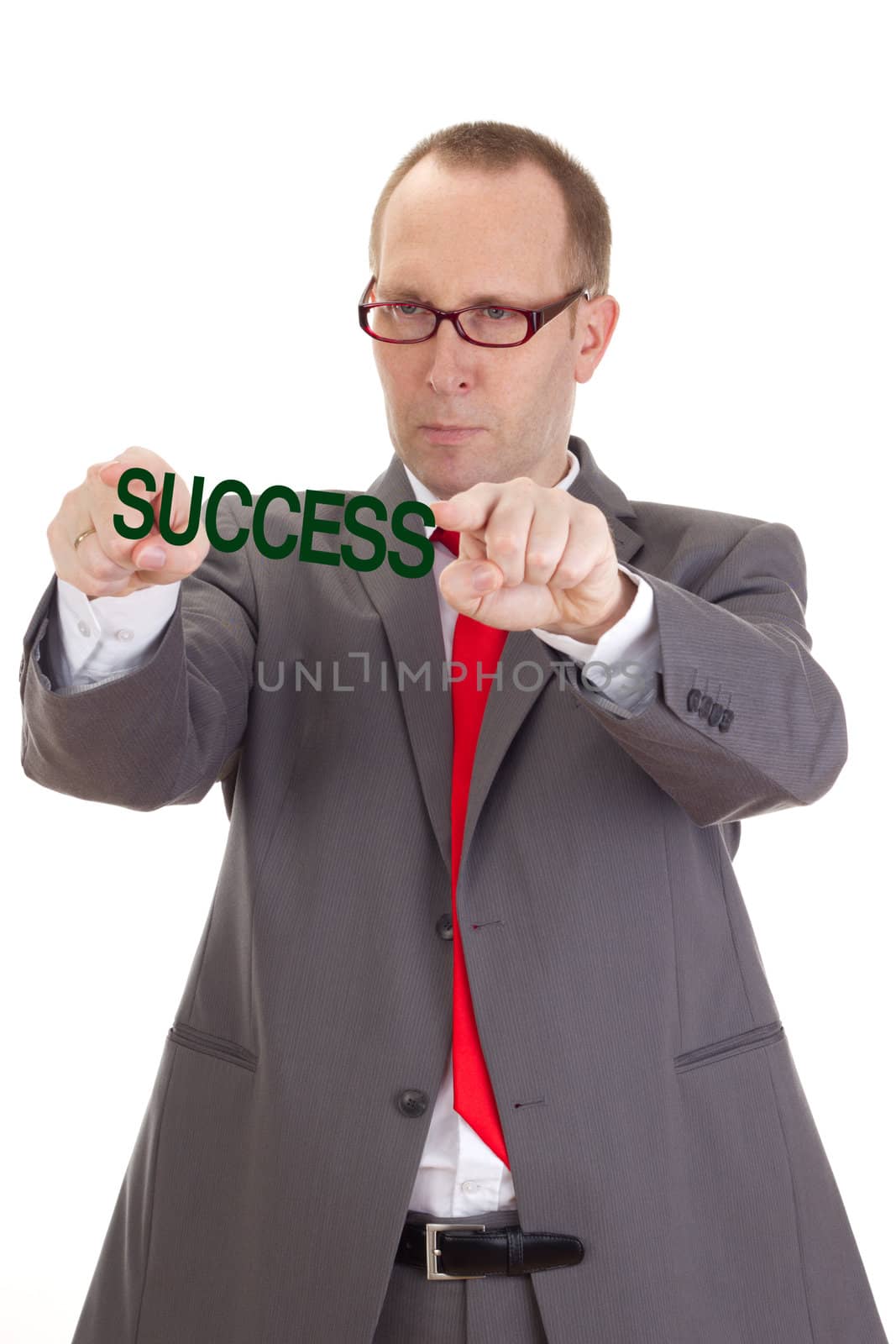 Businessman showing the word success