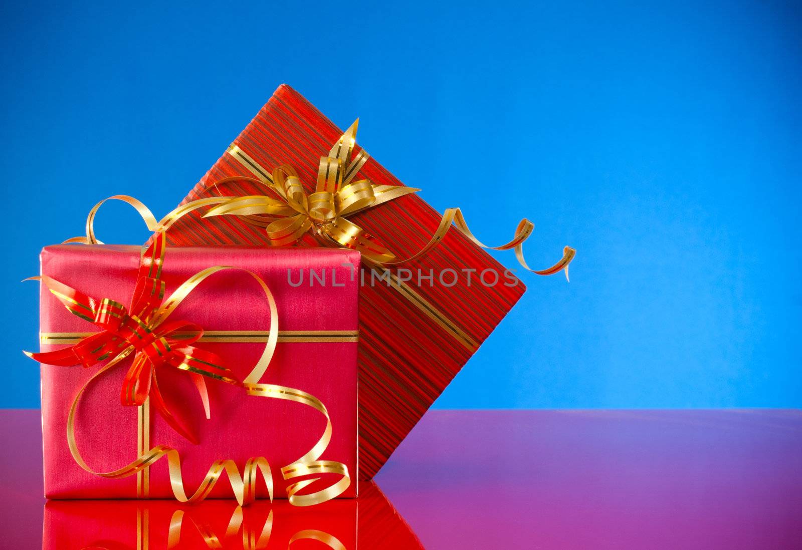 Christmas presents against blue background