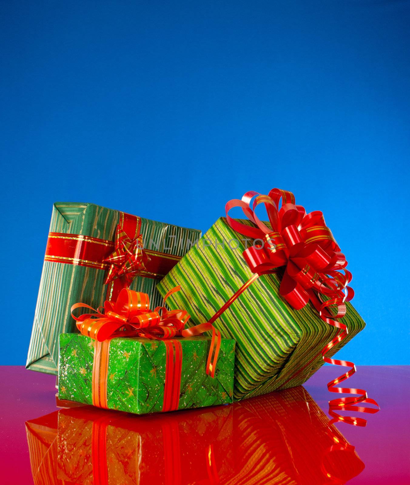 Christmas presents against blue background