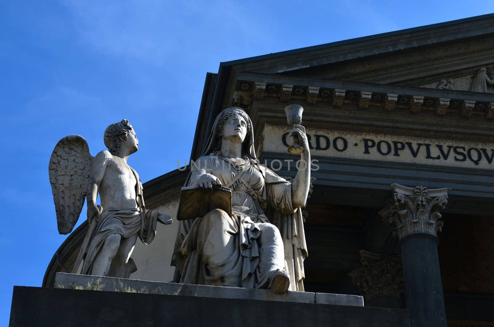 Closeup of statue in front of church by artofphoto