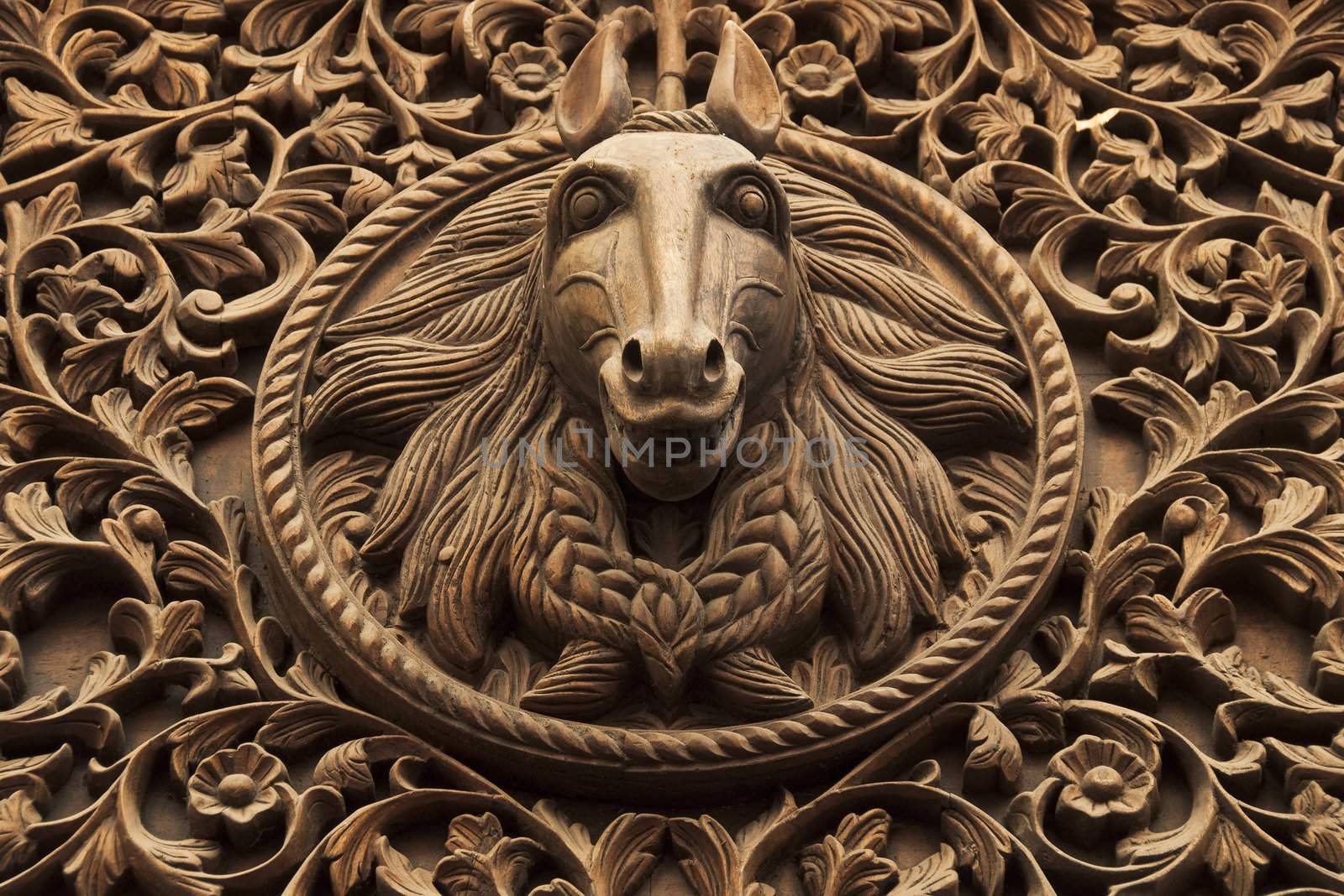 Horse head wood sculpture