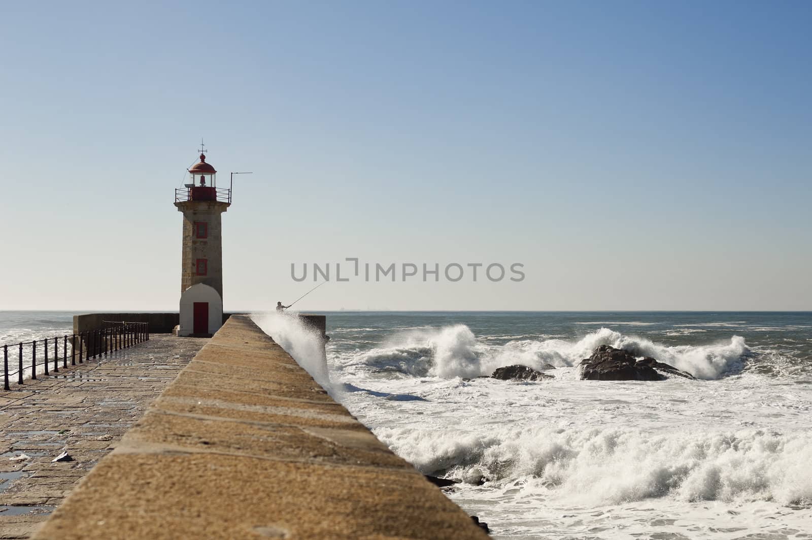 Historic lighthouse of Felgueiras in the river mouth of Douro, Porto, Portugal
