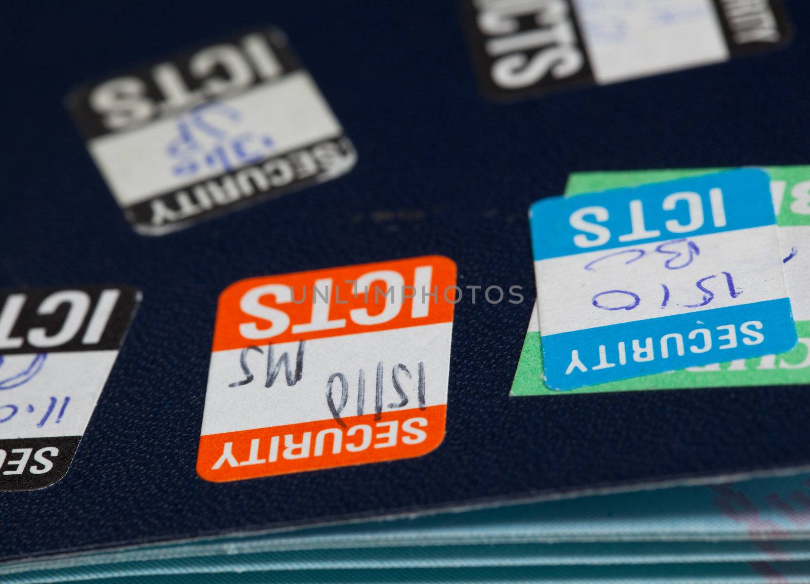 Stick on security stamps on back of passport