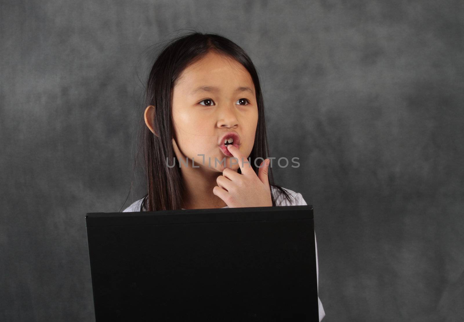 young child - girl- with computer keyboard