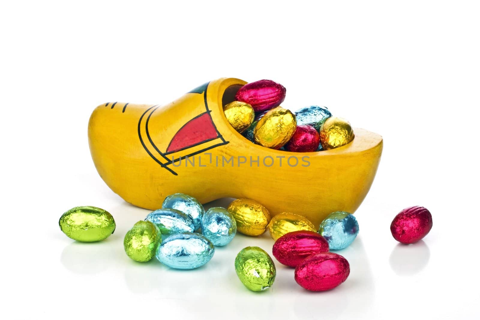Traditional dutch wooden clog with little colored eggs