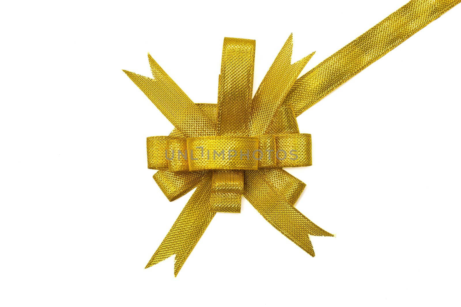 Golden gift bow. Ribbon on white background