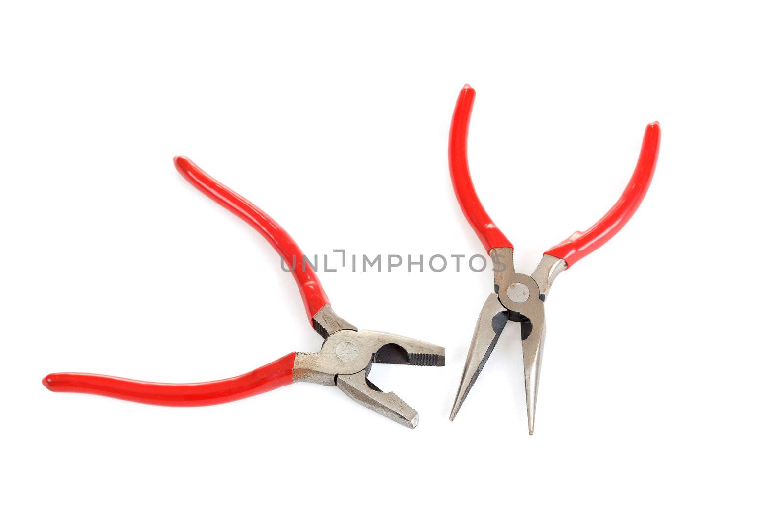 two different red pliers isolated on white