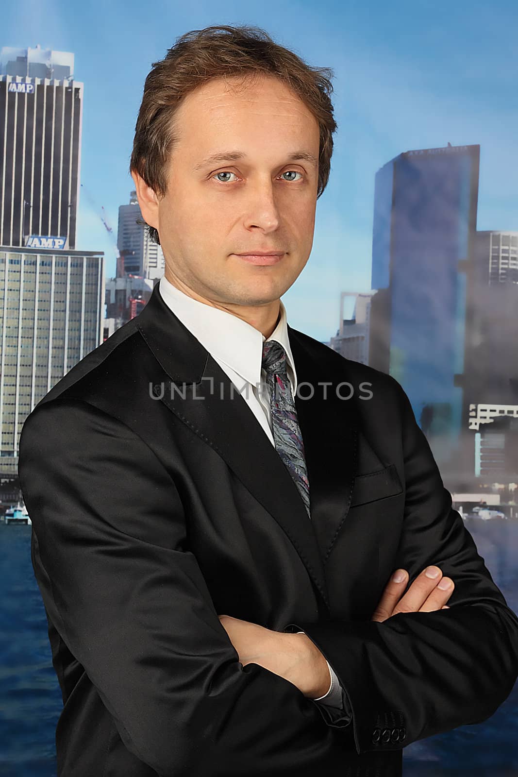 portrait of middle age businessman in austere suit