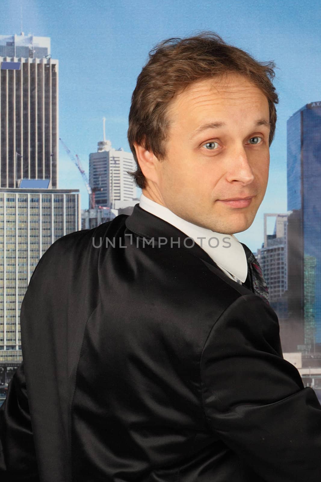 portrait of middle age businessman in austere suit