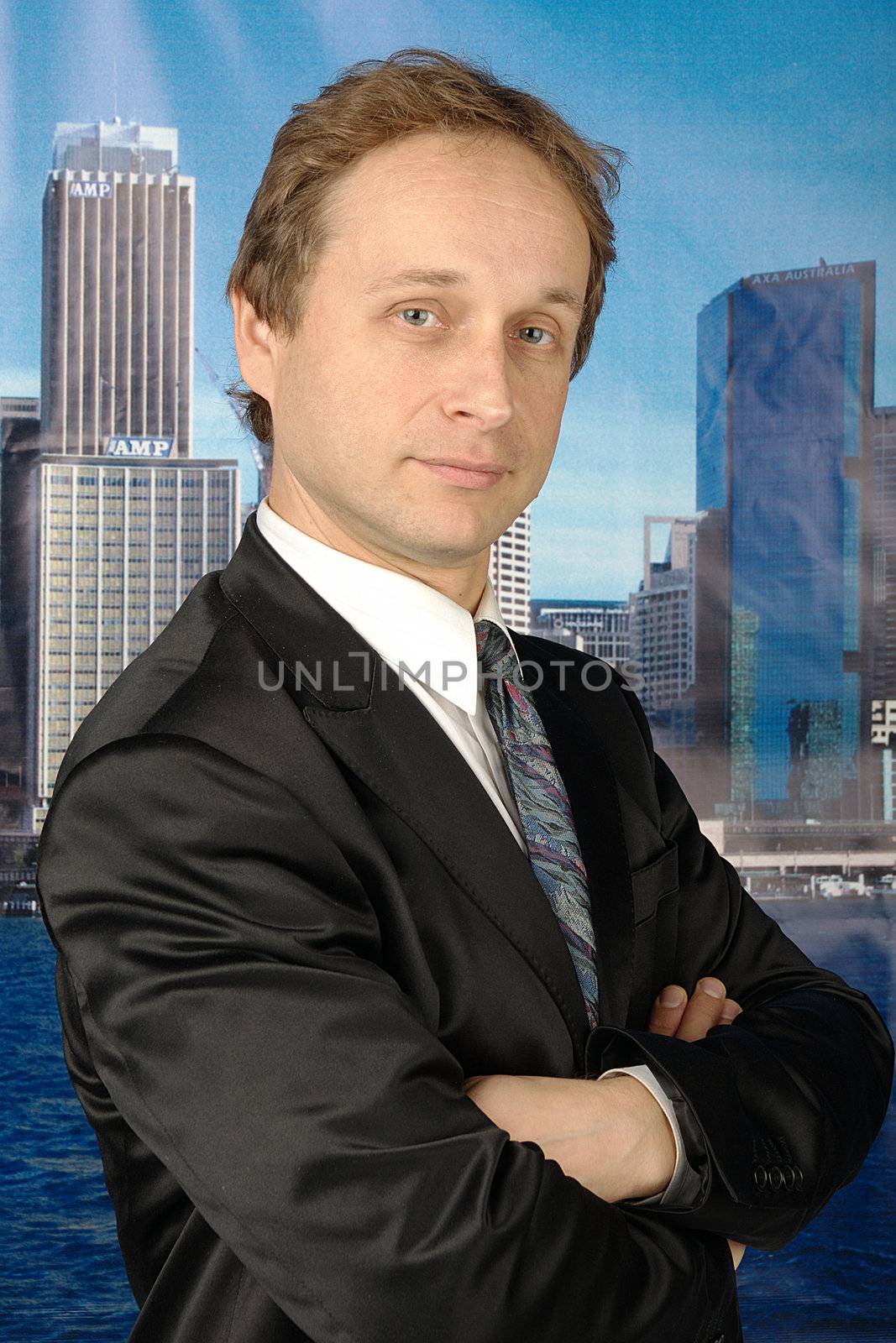 portrait of middle age businessman in austere suit