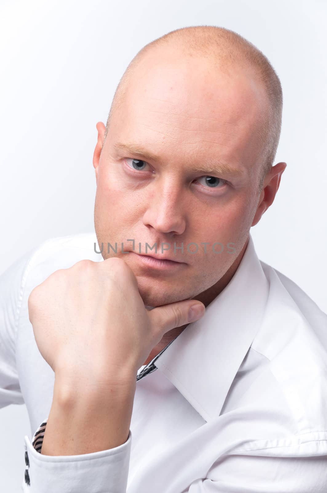 portrait of middle age businessman in austere suit