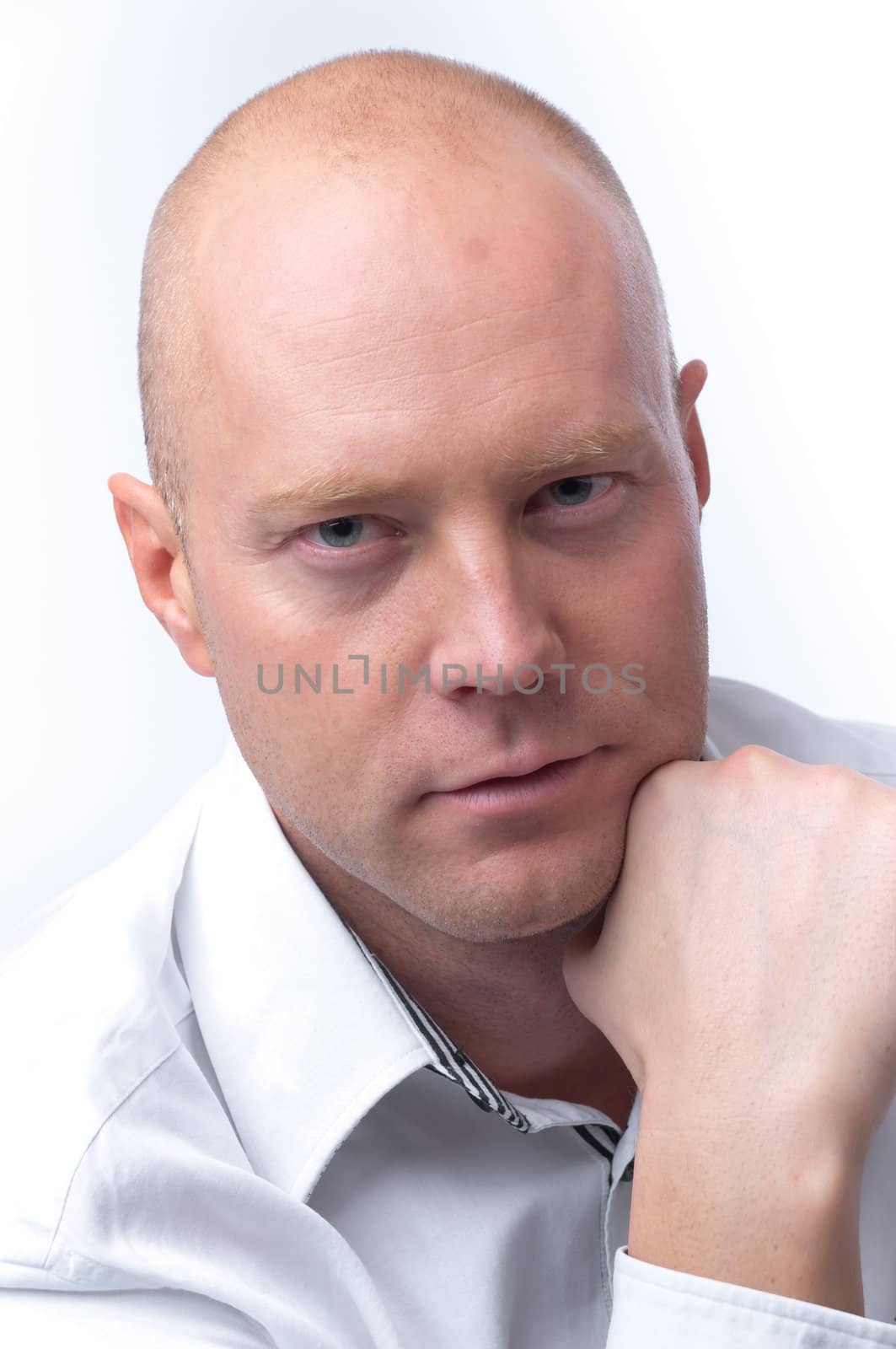 portrait of middle age businessman in austere suit