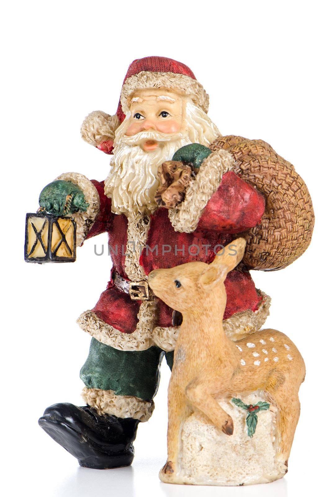 Ceramic Santa Claus isolated on white background.