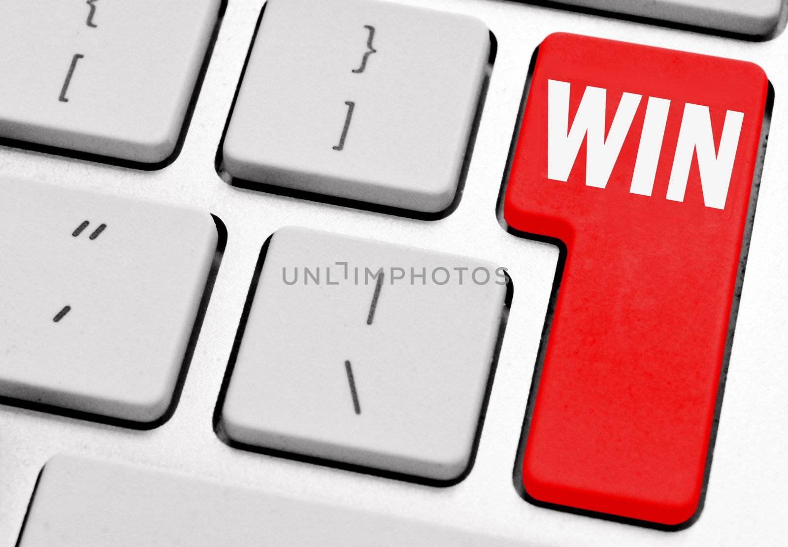Win marked on a red computer return key 