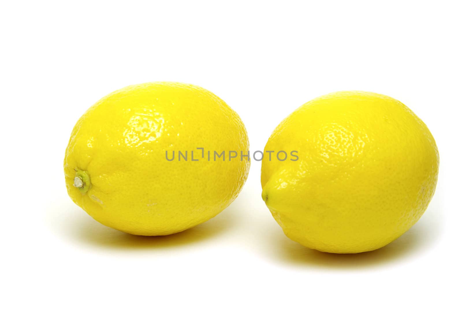yellow fresh lemons isolated on a white