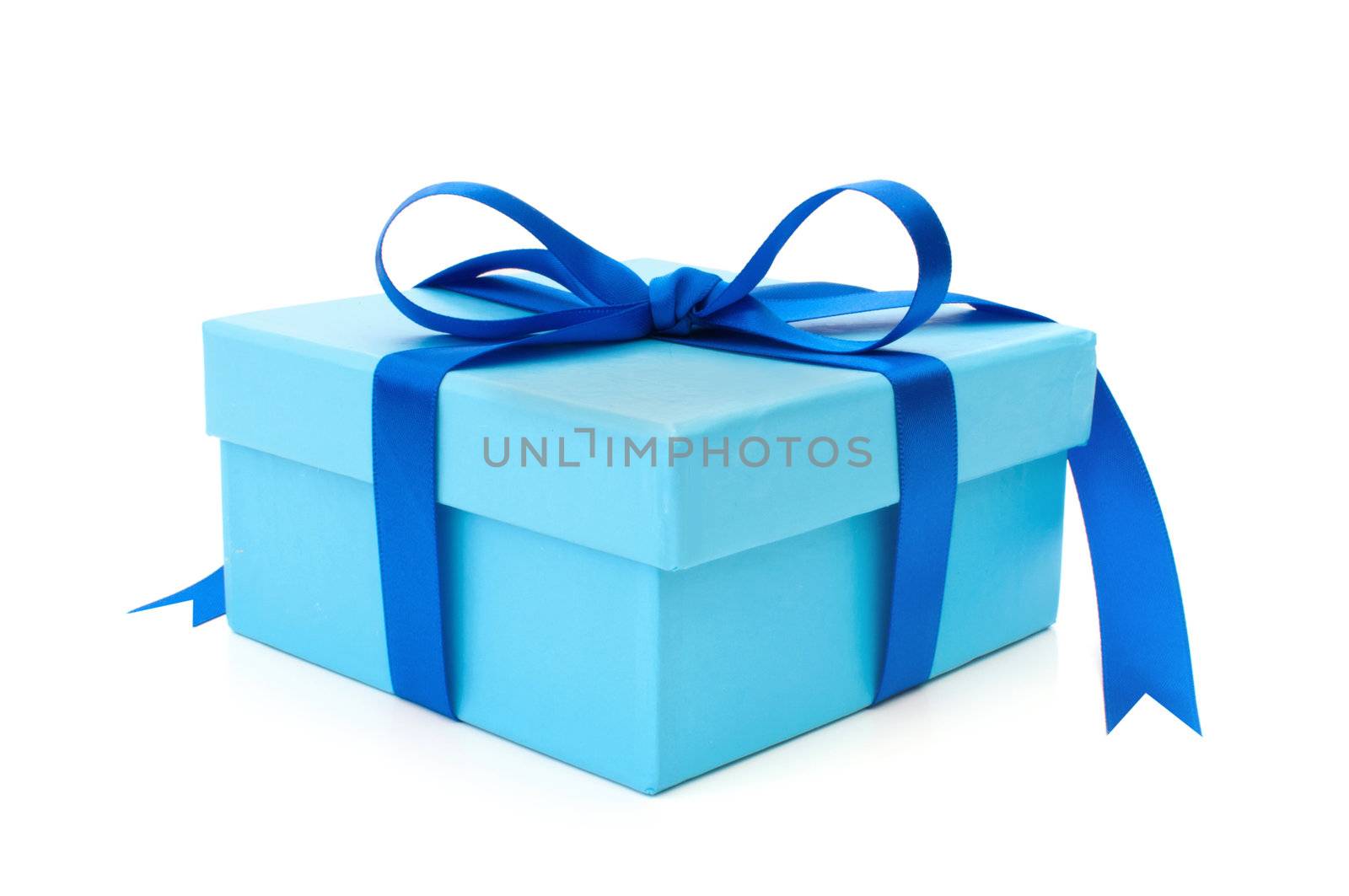 Gift box tied with a decorative ribbon bow 