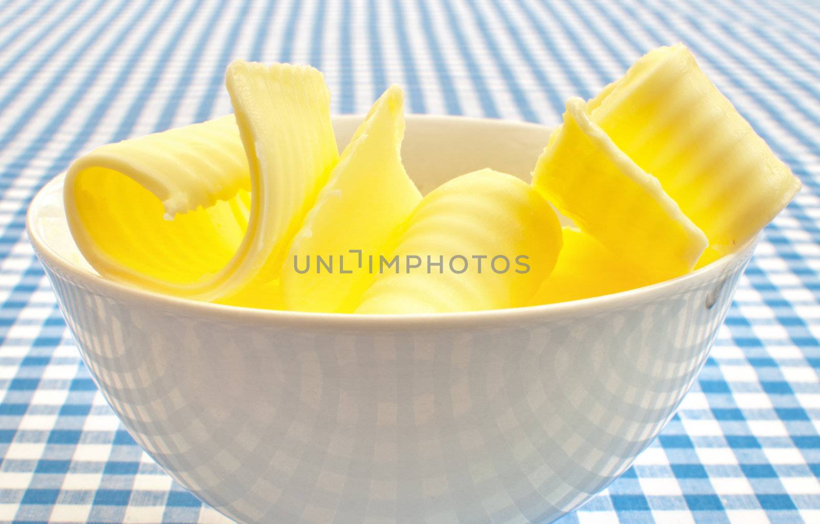 Several butter curls in a bowl 