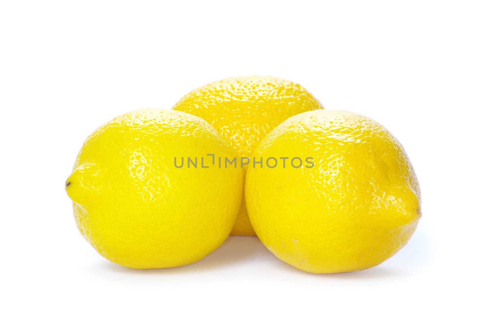 yellow fresh lemons isolated on a white
