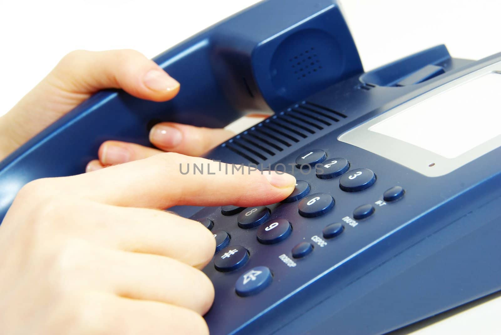 finger with  blue telephone keypad