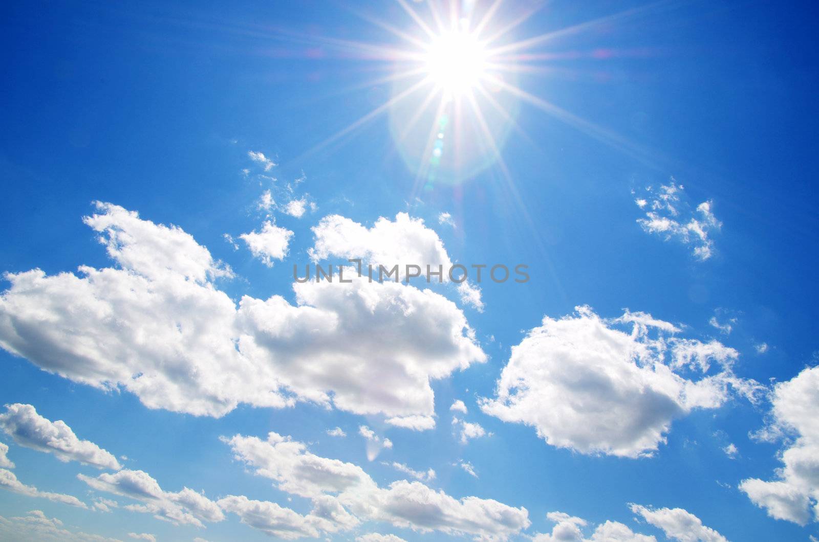 blue sky background with tiny clouds