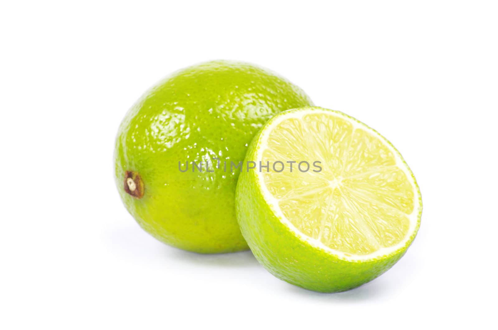 Fresh ripe lime isolated on white background