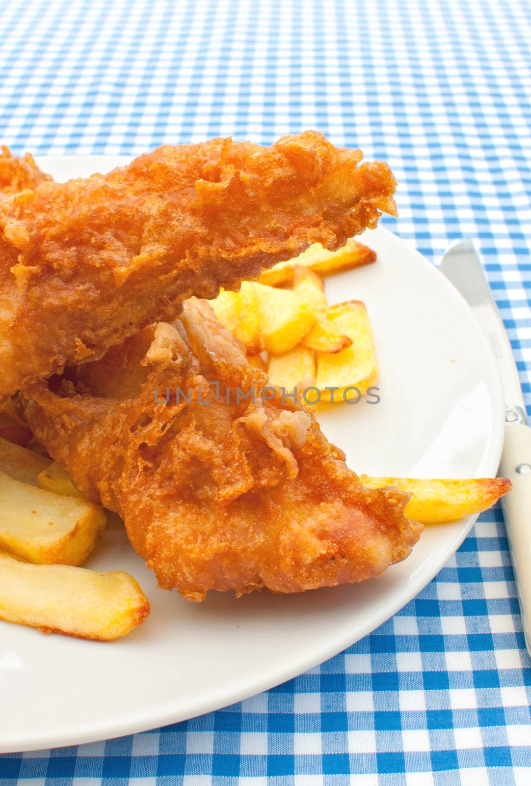 Traditional english fish and chips takeaway meal