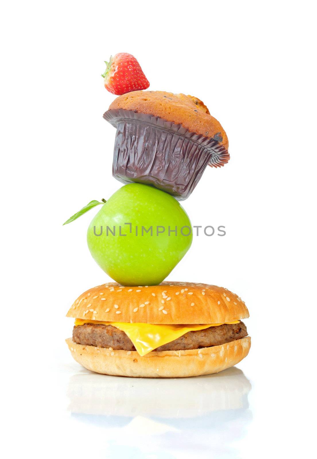 Stack of different foods both healthy and unhealthy 