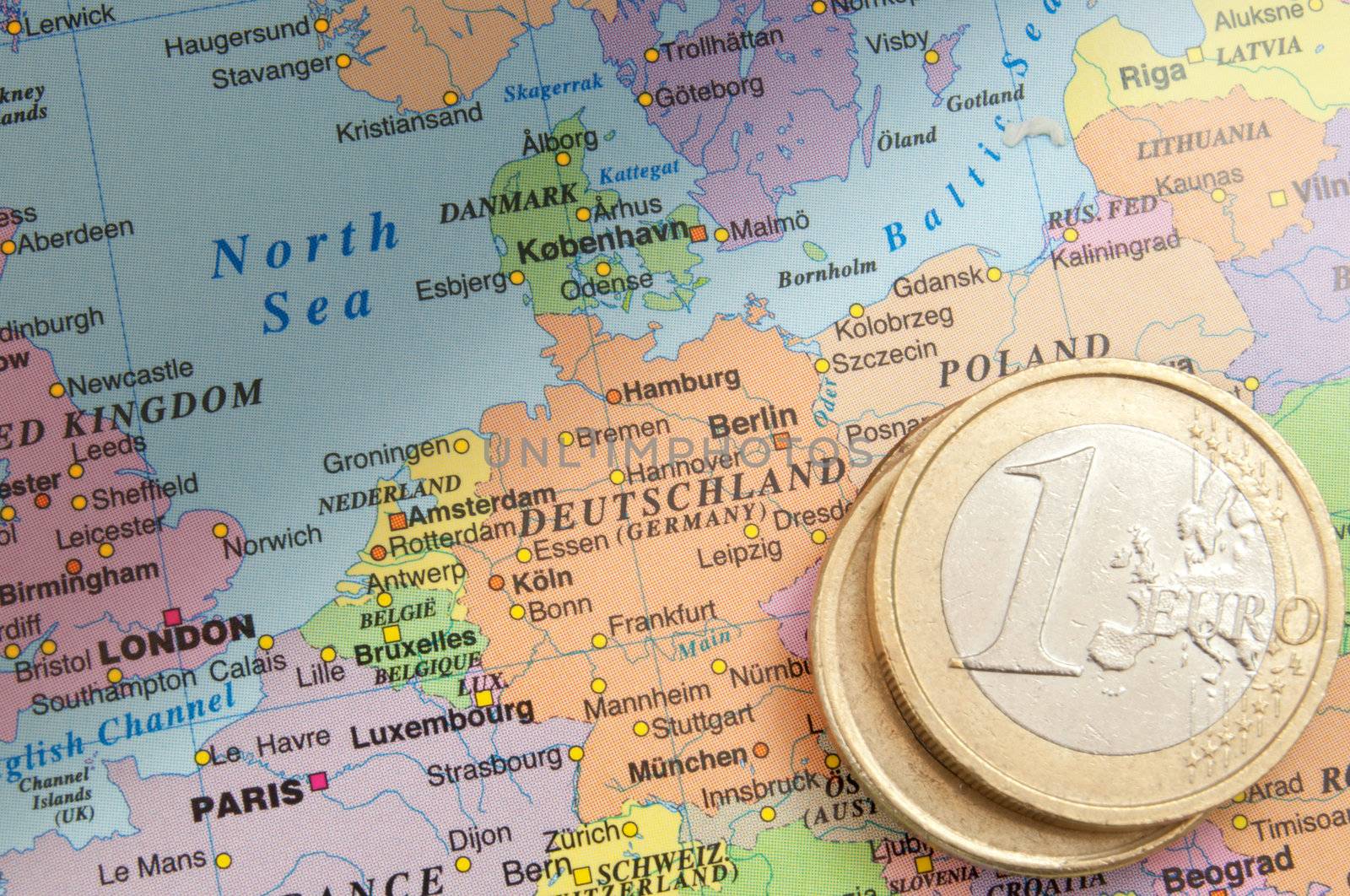 Euro coins on a map of Germany and Europe